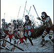 Image of boys versus men with arrows