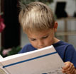 image of boy reading